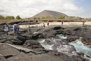 Exploring Fur Seal Grotto on Isla Santiago photo by Cheesemans’ Ecology Safaris