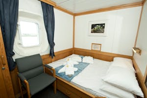 Ioffe ship One Ocean Suite bedroom with Cheesemans' Ecology Safaris