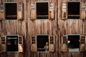 Myanmar woman in window photo by Scott Davis with Cheesemans' Ecology Safaris
