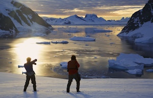 Visitors at Danco Island, Antarctica © Ron Niebrugge