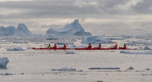 Guests Sea Kayaking in Antarctica© Jean Paul Delaharpe